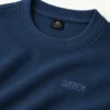 e70a8984-e7db-4abe-b1fa-963048160d03 Polera clásica de tela galleta azul